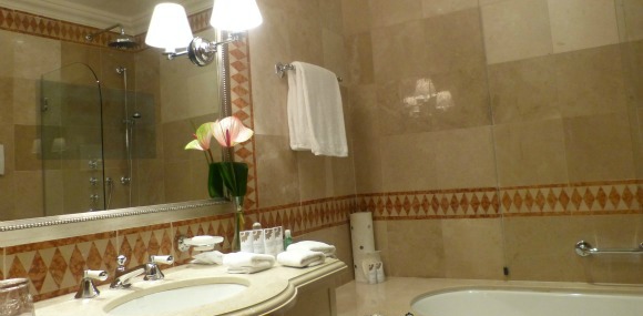 St Regis Florence Bathroom - The dark rectangle in the mirror is a built in television